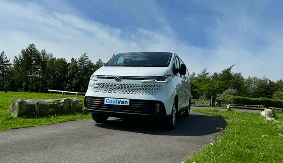 single refrigerated van driving on the road